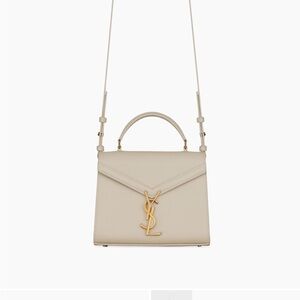 SAINT LAURENT Cassandra Mini Top Handle Bag in Grain De Poudre
Embossed Leather